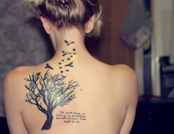 Bird tattoo with tree
