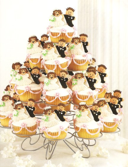 Bride and groom cupcake display