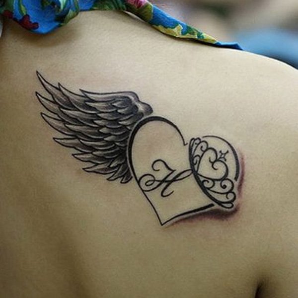 Chic Wing Tattoo with A Heart