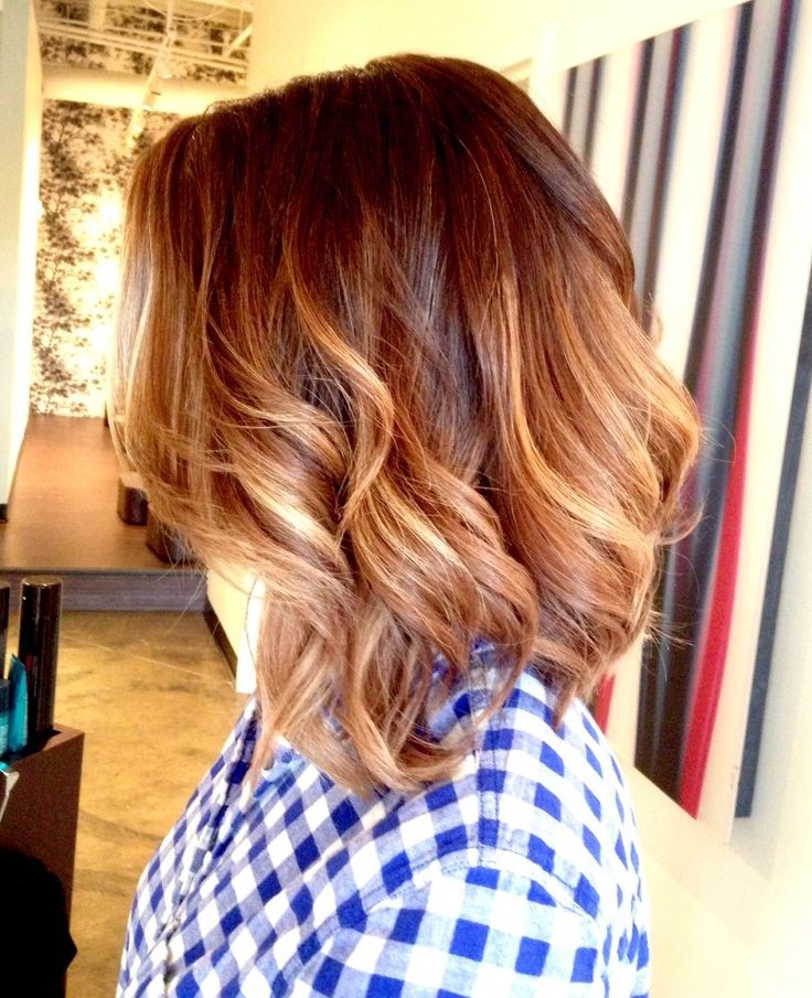 Layered Medium Wavy Hairstyle with Highlights
