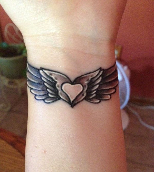 Lovely Wrist Tattoo with Wings