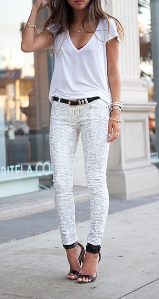 White snakeskin print pants