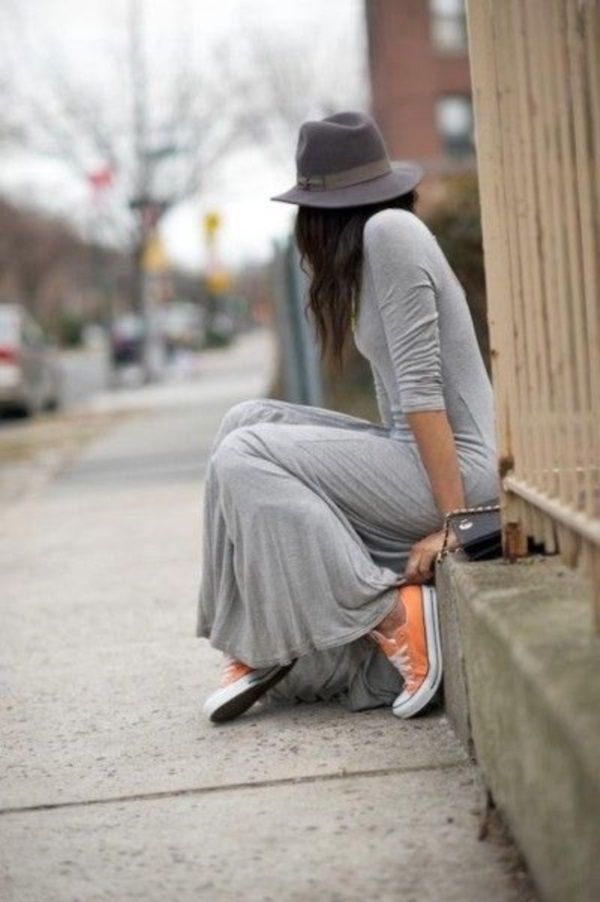 With a maxi dress and hat