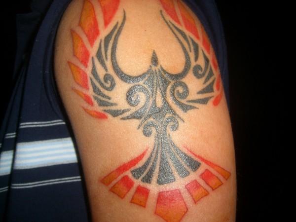 Flame tribal bird tattoo