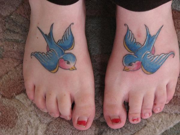 Swallows foot tattoo